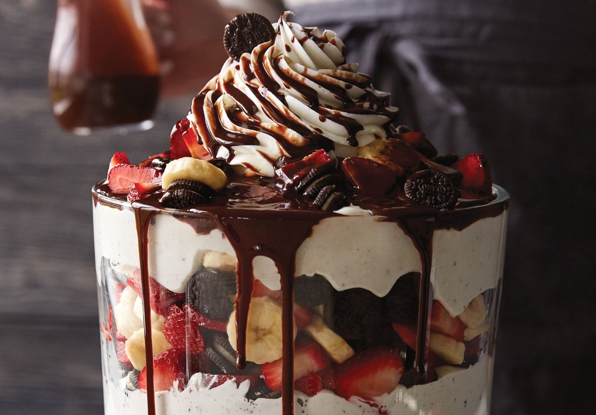 pamperedchef's tweet photo. It's #NationalChocolateDay! Celebrate with a big scoop of Cookies 'N Cream Sundae Trifle: https://t.co/N4NjgkiqGF https://t.co/xG8Pzd6bDK