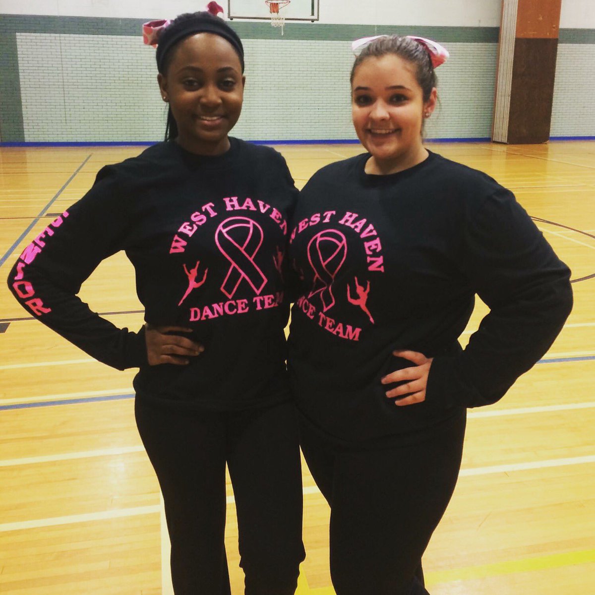 Our beautiful and talented seniors, Celiana &amp; Anna! #whdt #SeniorNight #PinkOut #whhs #danceteam #udagameday #underthelights
