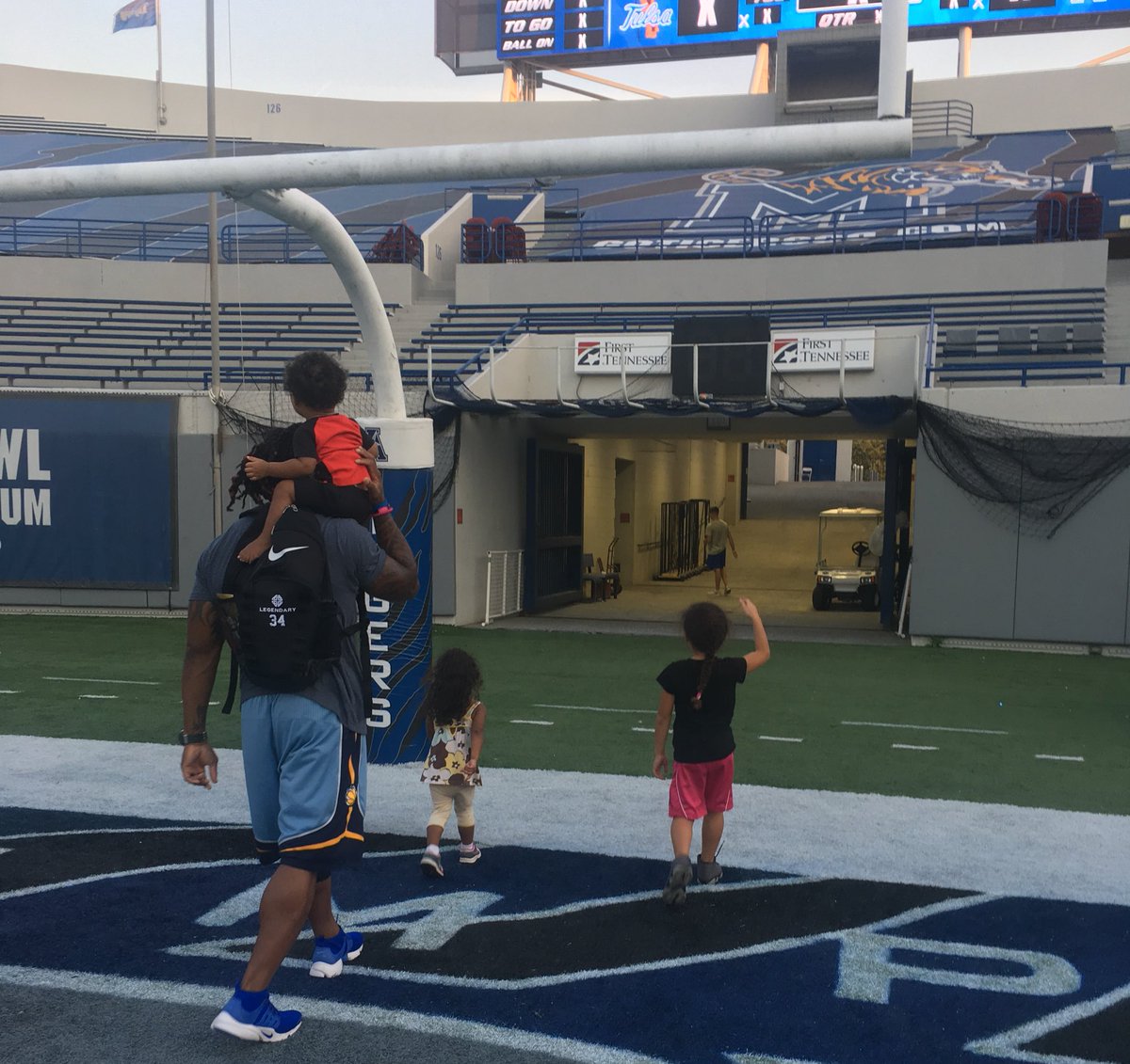 DeAngeloRB's tweet photo. My son's 1st time in the Memphis Tigers endzone...but hopefully not his last! 🤔 https://t.co/BTCEsnL6Yb