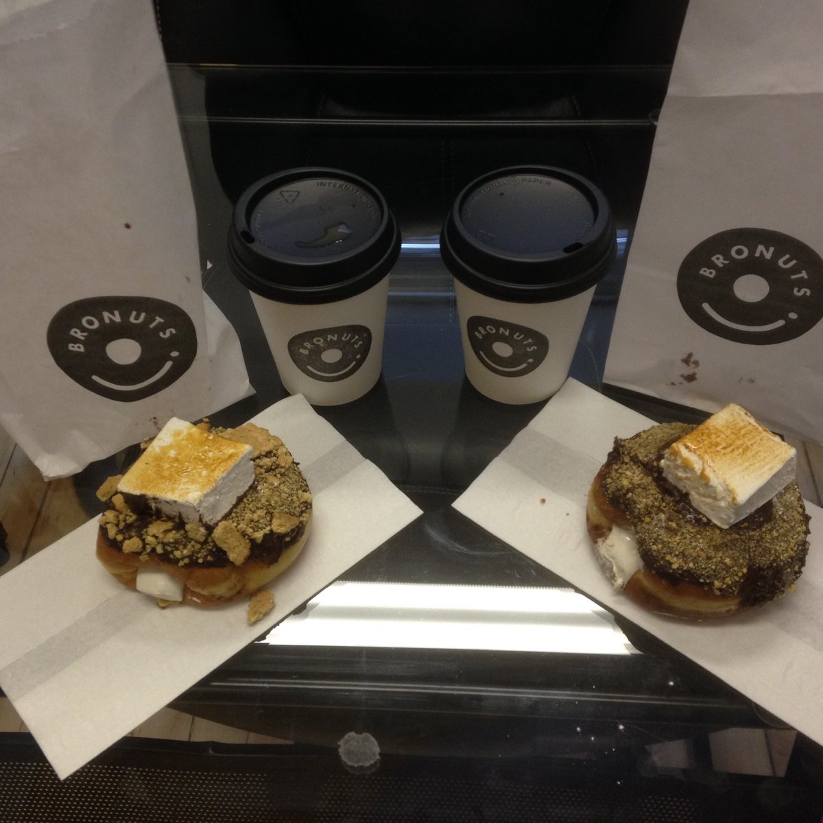 FuturpreneurMB's tweet photo. This is how @Nifnerf and I get through a crazy busy Friday afternoon. Thank you @bronutswpg for making S'more donuts! #myfavorite https://t.co/gPvDZutnoQ