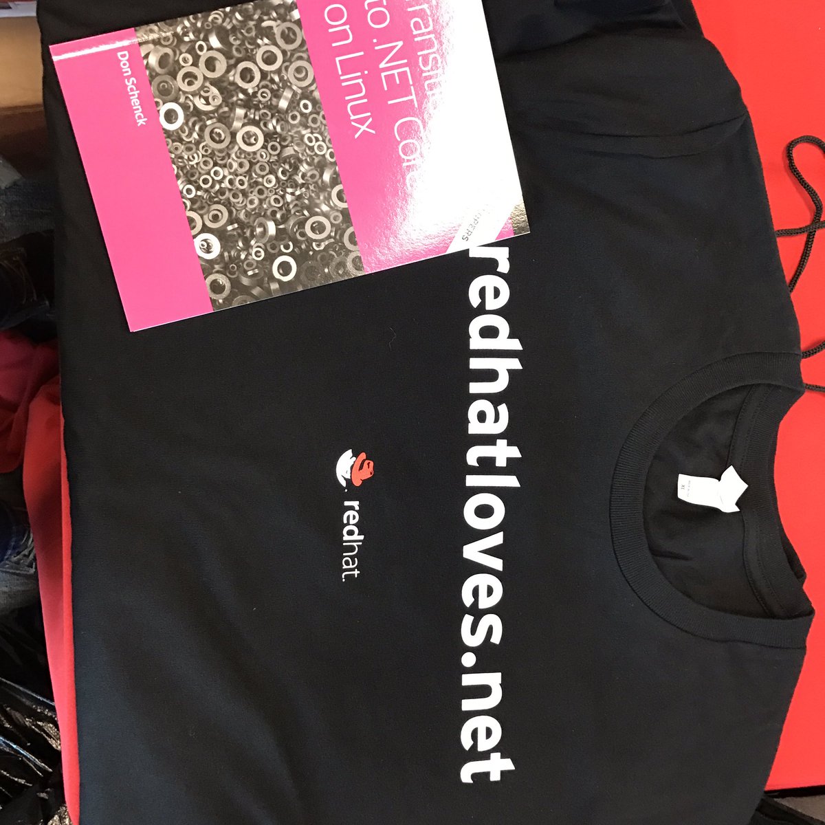burrsutter's tweet image. We have arrived @CodeCamp early birds are getting our tshirts #dotNETonLINUX redhatloves.net