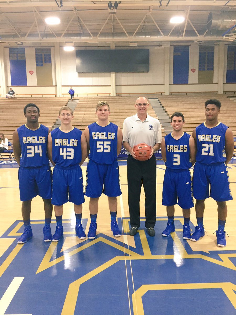 SMCHSBasketball's tweet photo. 2016-2017 Varsity Team. Five seniors one one pic, five @SMCHS_Football players in the other. BIG season kicks off today! #WeAreSM https://t.co/Kr0pzqOFhP