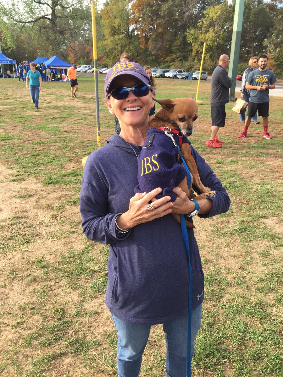 Coach Bugnitz and Rosalita are ready to cheer on the boys and girls cross country team today at Districts. Go Bombers!