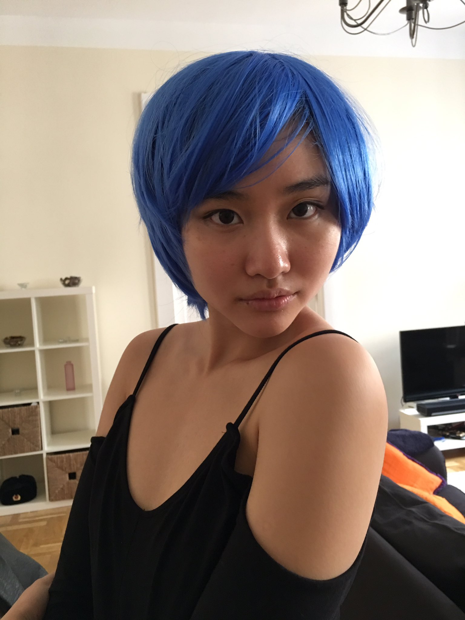 “Yumi wanted to try on some of my wigs 😉 which do you think suits her most...