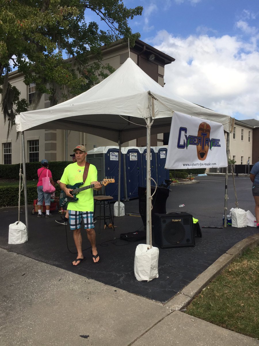 GiveTilItRocks's tweet photo. Cyber Trybe music rocking out near the finish! Check him out at https://t.co/re4epg03ZR. #orlandostrides #givetilitrocks https://t.co/ciaINbYCek