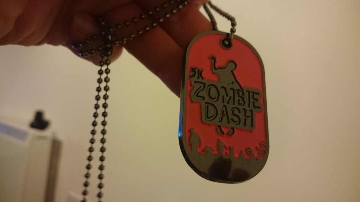 LJThorne's tweet photo. "infected"  dog tag from tonight's zombie dash https://t.co/WGpWic6gnO