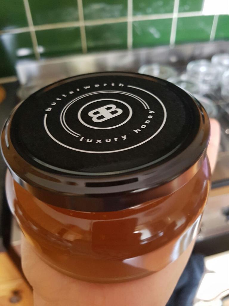 butterworthbees's tweet photo. The honey harvest being dispensed into our posh italian glass honey jars! Looking the part #hardworkingbees https://t.co/64uUbr6eo7