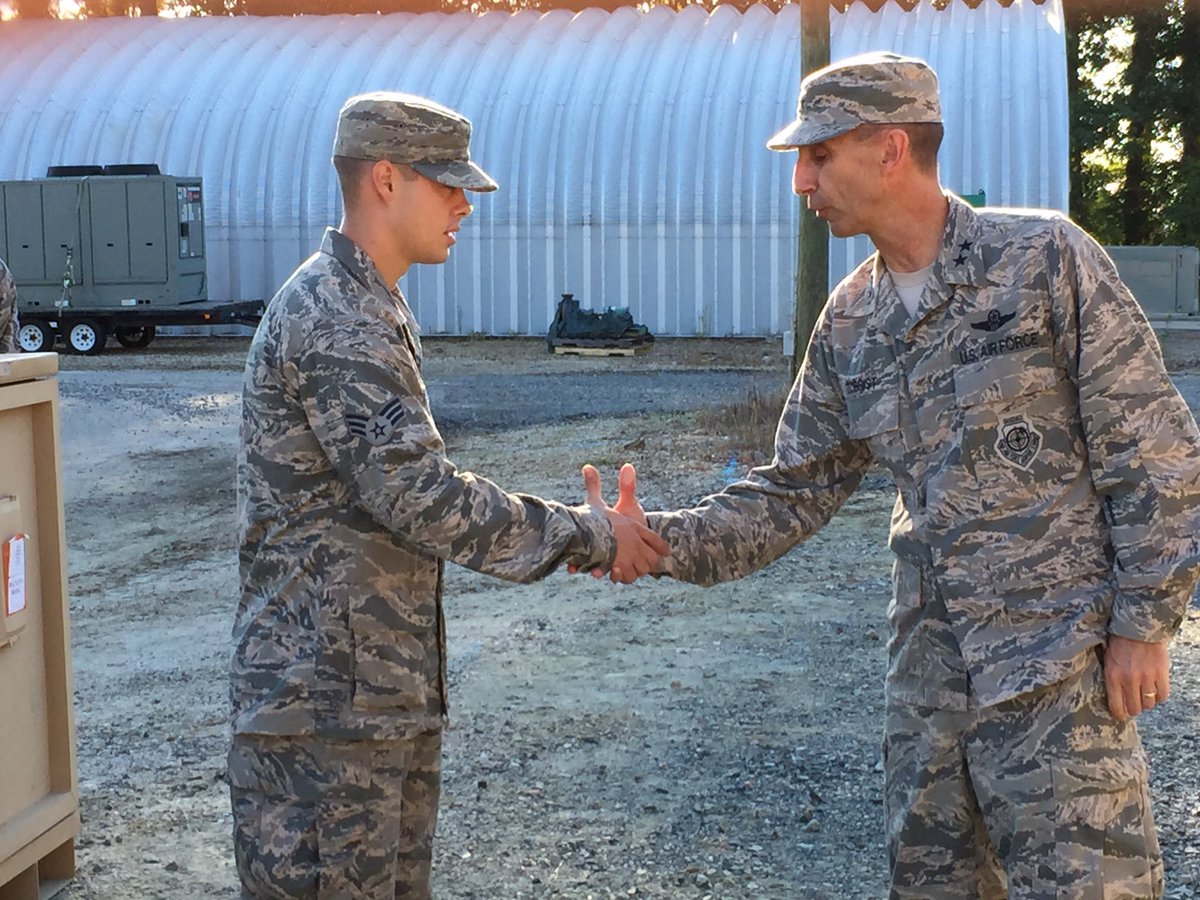 #jble Superstar SrA Posey receiving a coin from Maj Gen Zobrist.  Phenomenal medic!