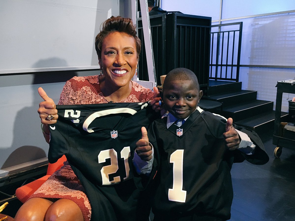 Saints's tweet image. Honorary Saint @Jarrius gave @RobinRoberts a #Saints jersey!