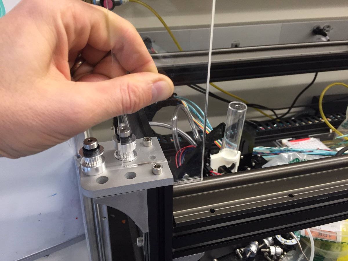 FlySorter's tweet image. The epoxy on the rails set up overnight, and now I&apos;m using a laser cut acrylic template to attach them at the proper height. #FlyRobot