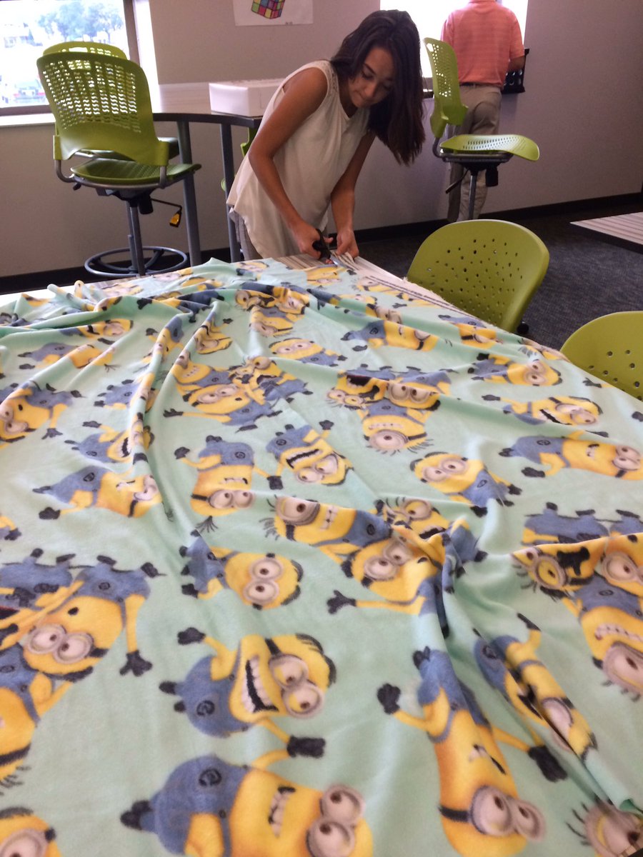 Ellis_GISA's tweet photo. Working on our tie blankets for Children's Hospital...of course our first one has minions. 😏 https://t.co/Cww1ph4xg2