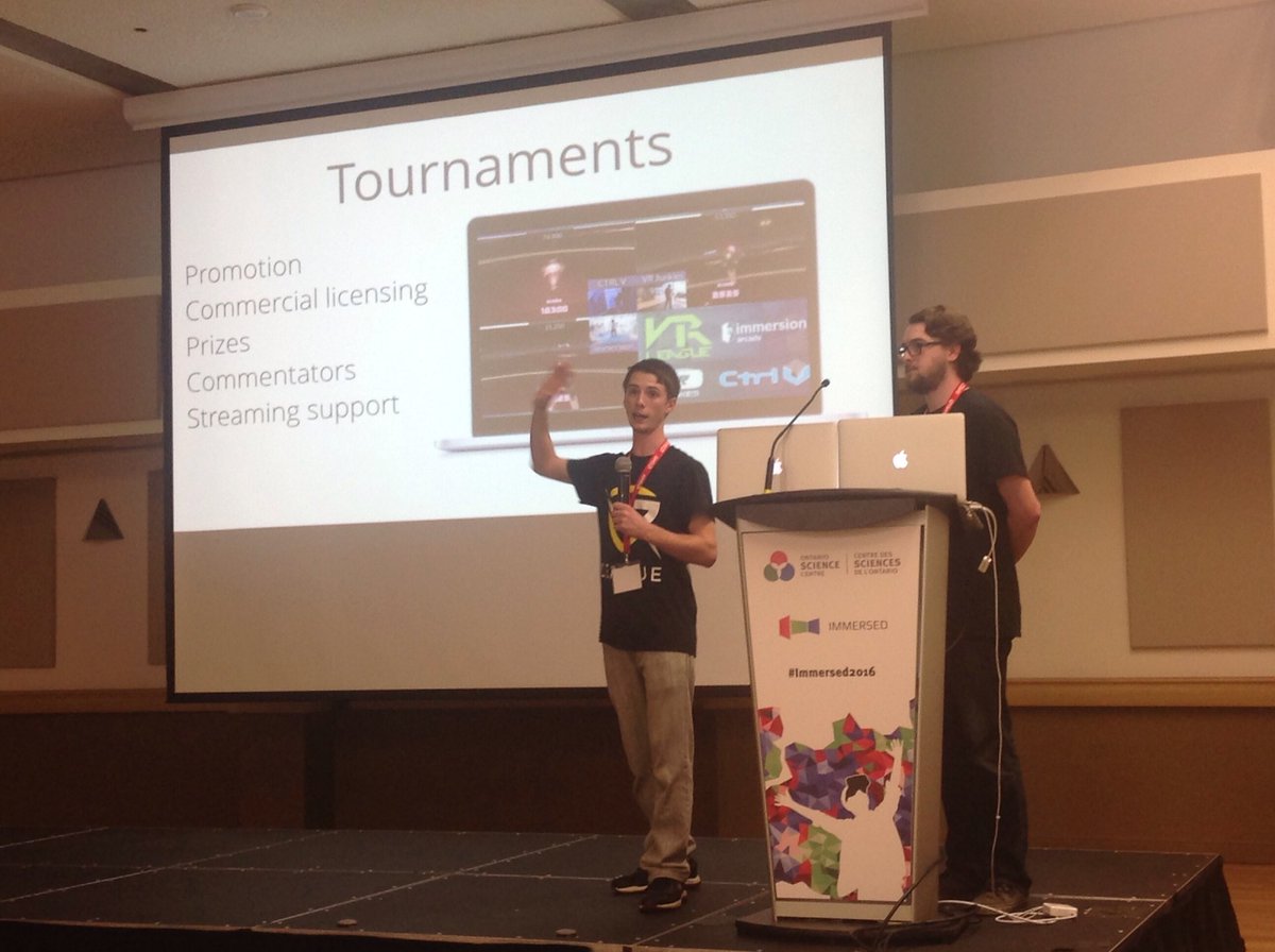 IFCSummit's tweet photo. Derick Downey @ddd_mbm &amp; Brian Jesse @Brain_Bacon of @ImmersionArcade discussing Out of Home #VRArcades. #VirtualReality #VR #AR @vr_league https://t.co/WjZOt7poha