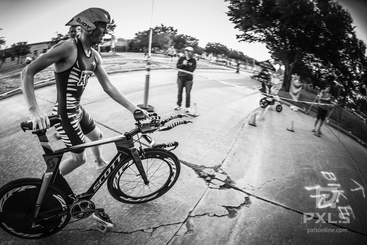 TAMU_Triathlon's tweet photo. Garrett off the bike ready to run his way into second place overall 🏃🏻 https://t.co/nIbMkAXCfd