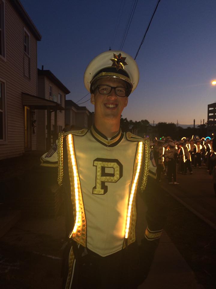 PurdueCIT's tweet image. Techie Tuesday: CIT student and band member shined his lights during the homecoming parade #PurdueCIT