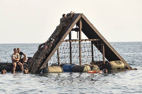 USArmy's tweet photo. .@FLGuard Soldiers assigned to @CJTFHOA complete a water obstacle as part of the French Marines Desert Survival Course, Djibouti, Oct. 10 https://t.co/9qTxM7VIDG