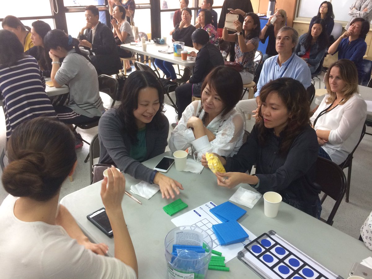 ClaassenJanet's tweet photo. Parents model multiplying with decimals #saschina @mpallen https://t.co/MrbYCRhTI8