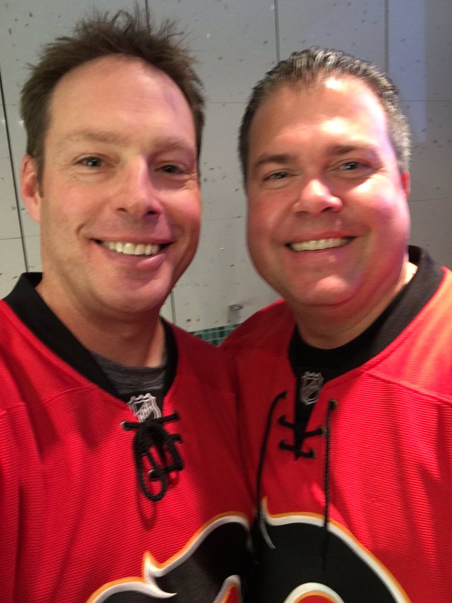 theturx's tweet photo. Chillin at the @NHLFlames game with the newest Flames fan Trent Harris. #allheartflames https://t.co/ZtoSlvNxKK