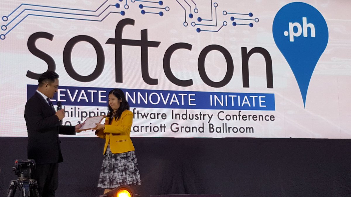 PointwestPH's tweet photo. @VeckBasinang receives a plaque of appreciation from #softcon2016 for her talk on Analytics redefining banking. #pointwestxsoftcon2016 https://t.co/3VAQ57BeaZ