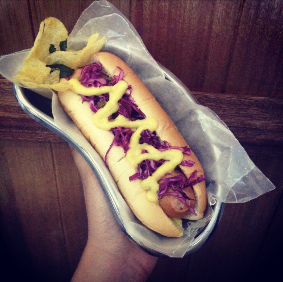 BubbaLab's tweet photo. Bring on the Butterbeer Frappe for Bratwurst sausage sandwiched in soft roll, topped w/ sauerkraut. Complemented w/ #SaltedEggyolkChips! 🍺🌭🤓 https://t.co/83RtX33wMN
