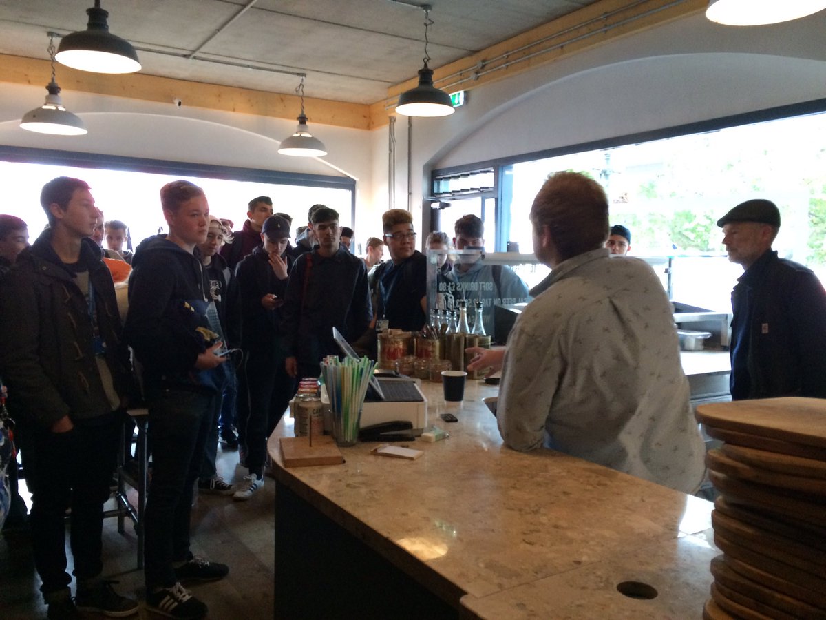 CCNBusiness's tweet photo. Students question owners of Brick Pizza about an interesting challenge to design an artisan Pizza @pizza_brick https://t.co/UZ8bAOIjmX