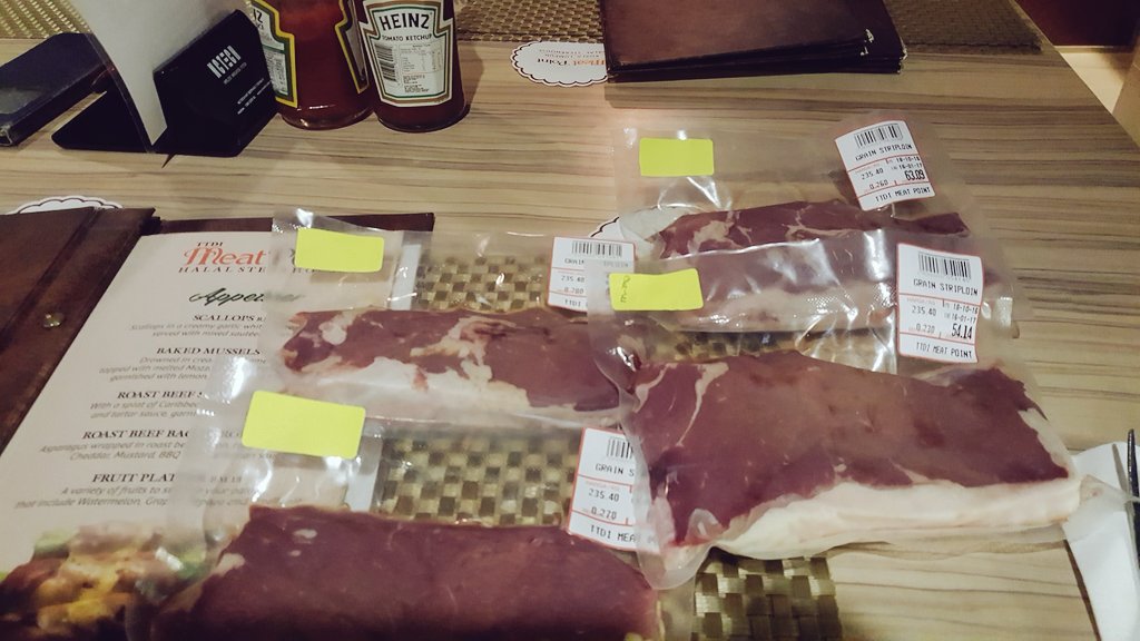 gt_low's tweet photo. #MeatPoint choosing my steak for dinner .. medium to well with sauce on the side lest I annoy the chef. Striploin grain fed 230 grams. https://t.co/KBL0atoRmE