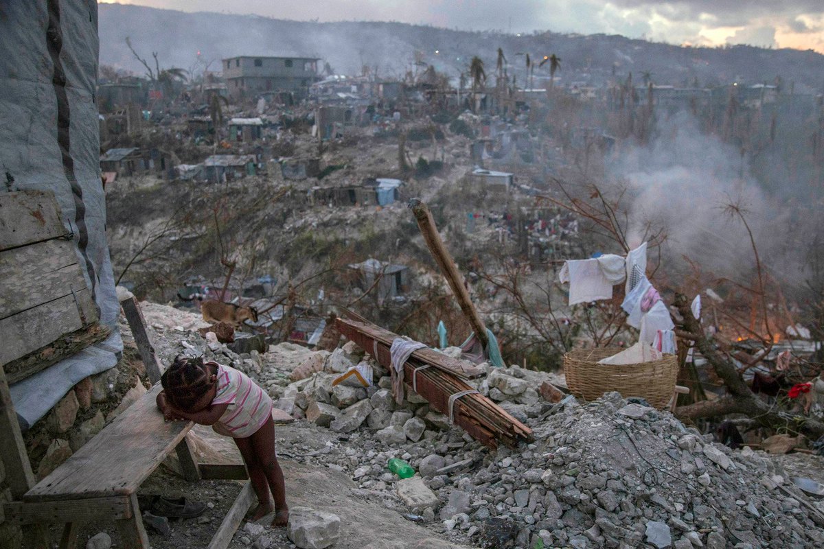 UNICEF's tweet photo. Heartbreaking. A toddler stands by the rubble after #HurricaneMatthew. #Photooftheweek Jérémie, #Haiti https://t.co/VB9JdpDEm2