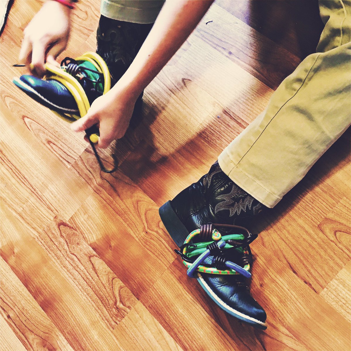 Sageonomy's tweet image. Wearing #bungeecords as a belt is so #lastseason. Now we're wearing them around our shoes. #highfashion