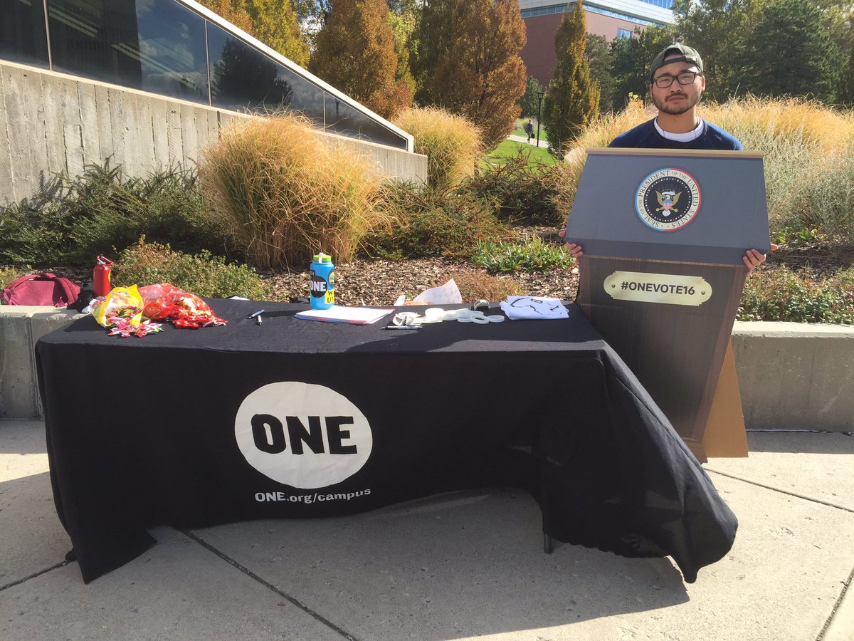 ONEatUtah's tweet photo. Stop by our table on the library plaza to ask the future president to fight to end extreme poverty! https://t.co/WI60Ta29OR