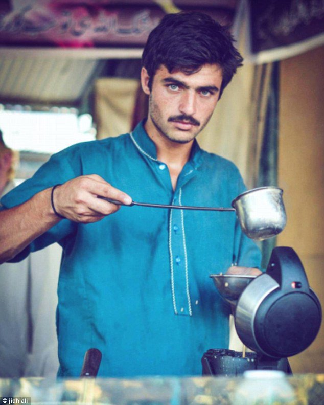 DailyMail's tweet photo. Drinks vendor becomes a model after photos of him working in a Pakistan market go viral https://t.co/GQe0FzFp4P https://t.co/oFhIS5Uly8