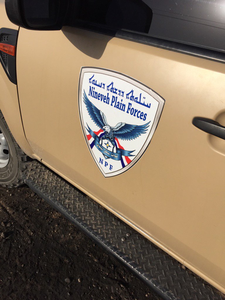 jrug's tweet photo. Badge of Assyrian Christian militia fighting for their ancient villages in Iraq. ISIS have desecrated their churches: https://t.co/xjLkAhbU0S