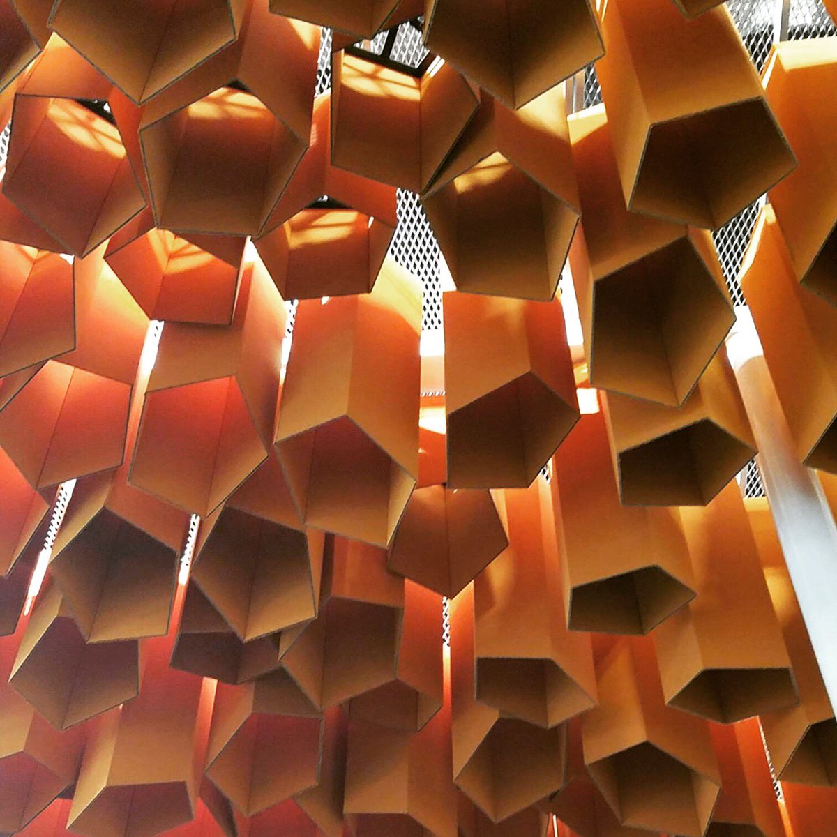 Sunbrella's tweet photo. Playing with shadows. Buildout of a 2016 #futureofshade winner at the Sunbrella booth at #ifaiexpo.  Booth 1718. https://t.co/2CMa0936sf