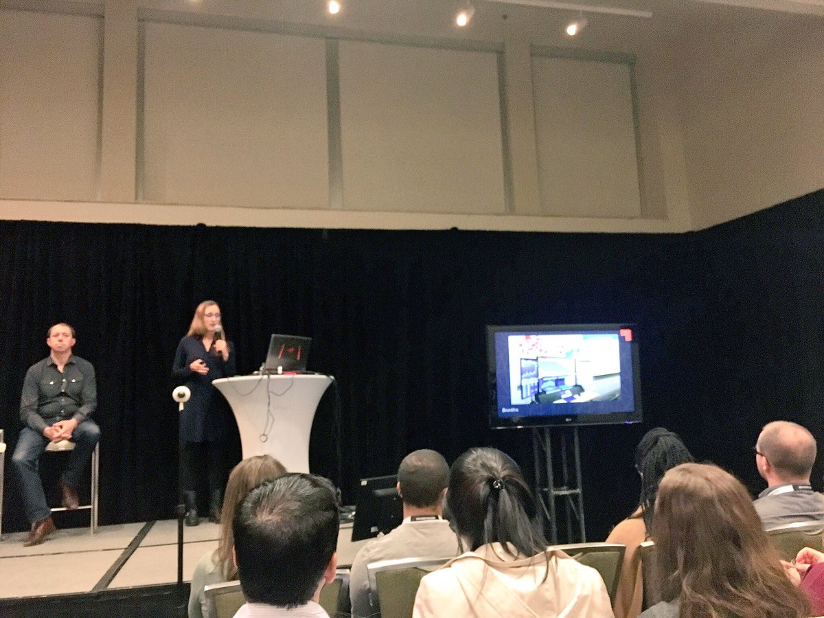 evanwest's tweet photo. .@ashepp &amp; @heatherraikes from @8ninths and the awesome holographic workstation w/ @HoloLens. #SIC16 https://t.co/N8AvIM86vu