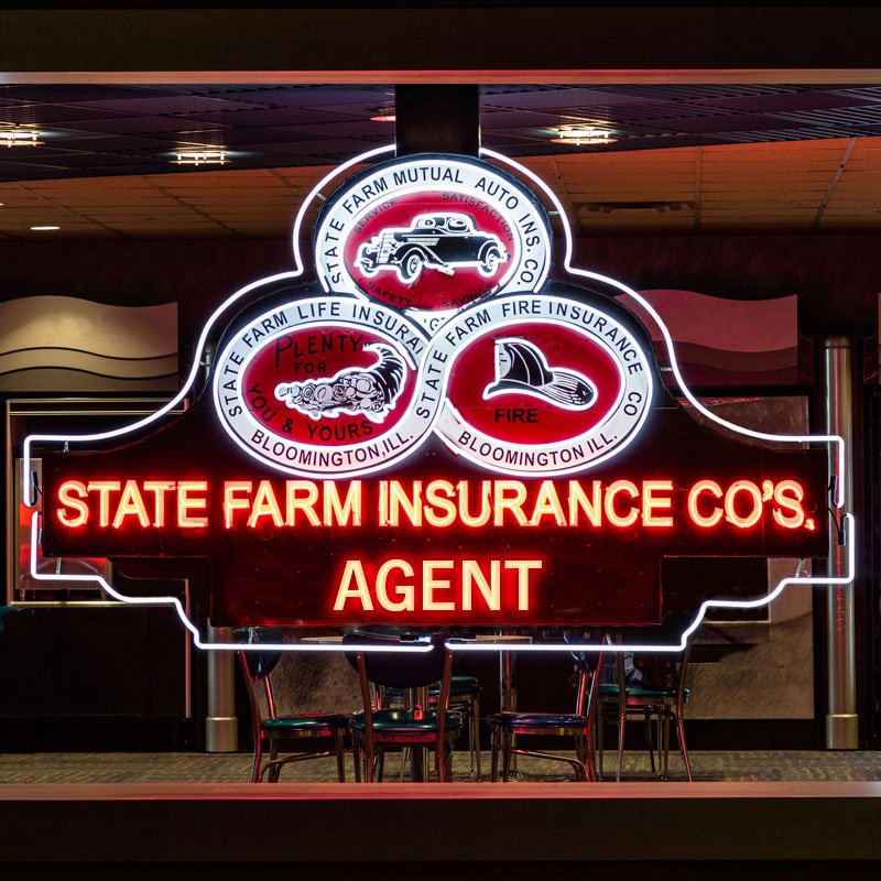 WacoJoe254's tweet photo. This agent sign shows the 1935 @StateFarm logo. Today’s logo has changed, but we’re still here to help. #Throwback #FromTheArchives https://t.co/MXqKeEsLCO