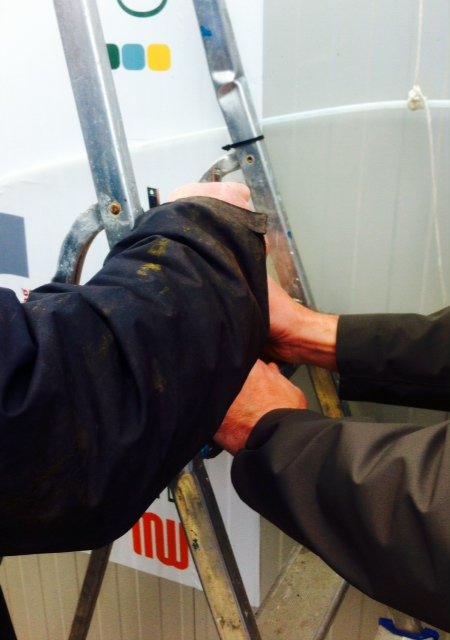 JoanneCSheahan's tweet photo. Excuse the terrible angle: @TipperaryCheese farmer Liam Hayes lights a flame from biogas produced by Demetras Ad-bag @SEAI_ie #research 2016 https://t.co/l7lZx6W4lA