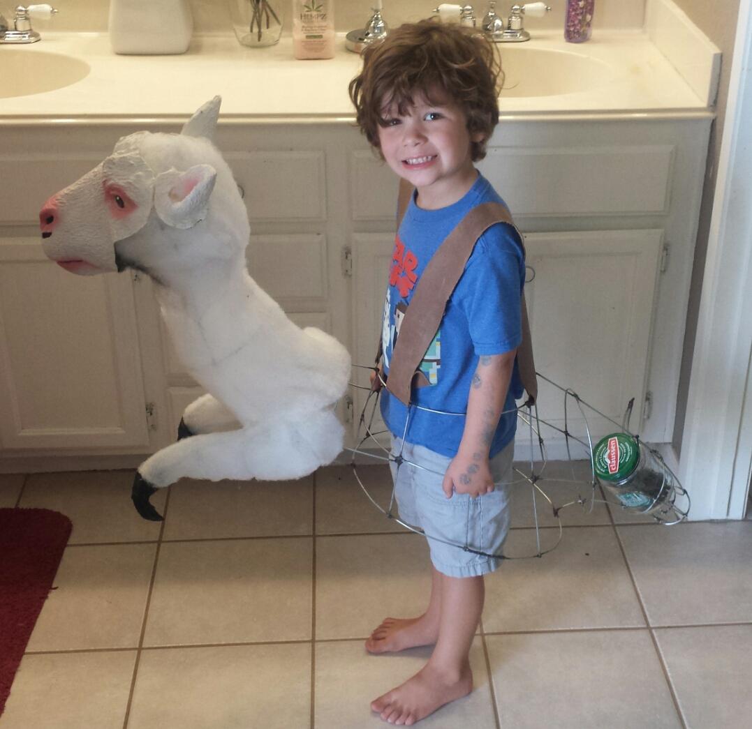 Clint_Case79's tweet photo. People have been asking how I made it. Here u go. Early stages. Pickle jar filled with screws to balance the weight. #tauntaun #costume https://t.co/EPwehmn3Yg
