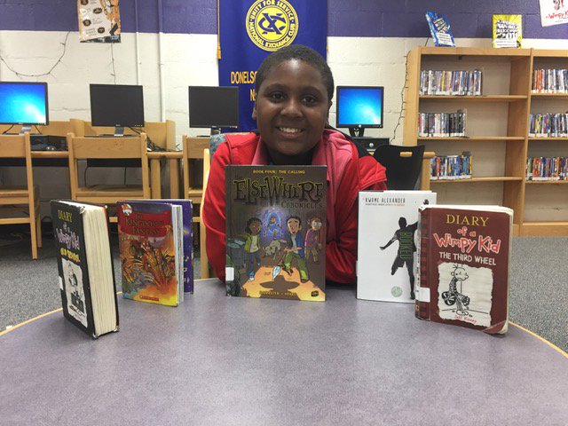 nashville_Z's tweet photo. Check out more pictures of our students with their favorite books. You don't want to miss these! #lightsonliteracy https://t.co/q64jiLtQ3P https://t.co/VqaK3Vc9GV