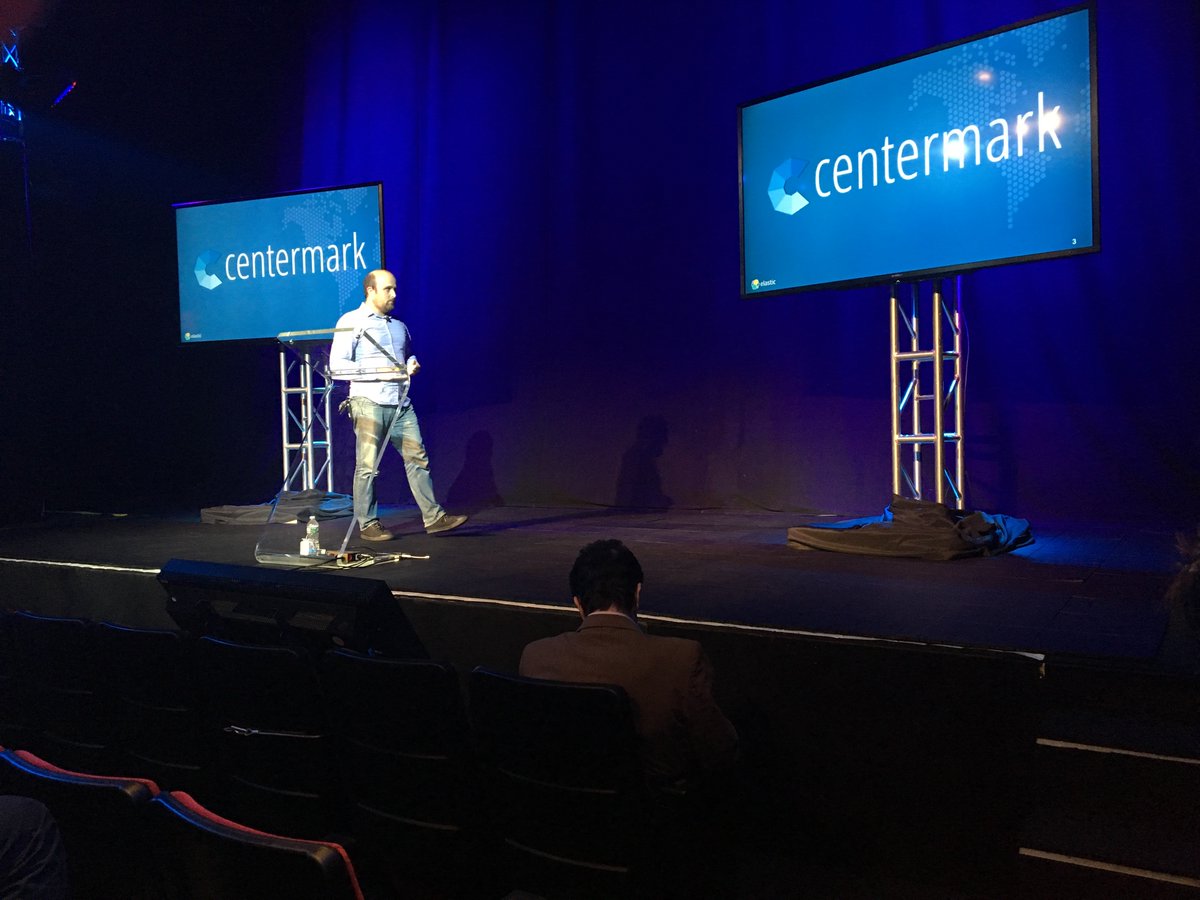 YodleTech's tweet photo. Mark Drago speaking at #elasticon #nyc about @Yodle's use of #elasticsearch in the #centermark product. @elastic https://t.co/tjW0tVLinc