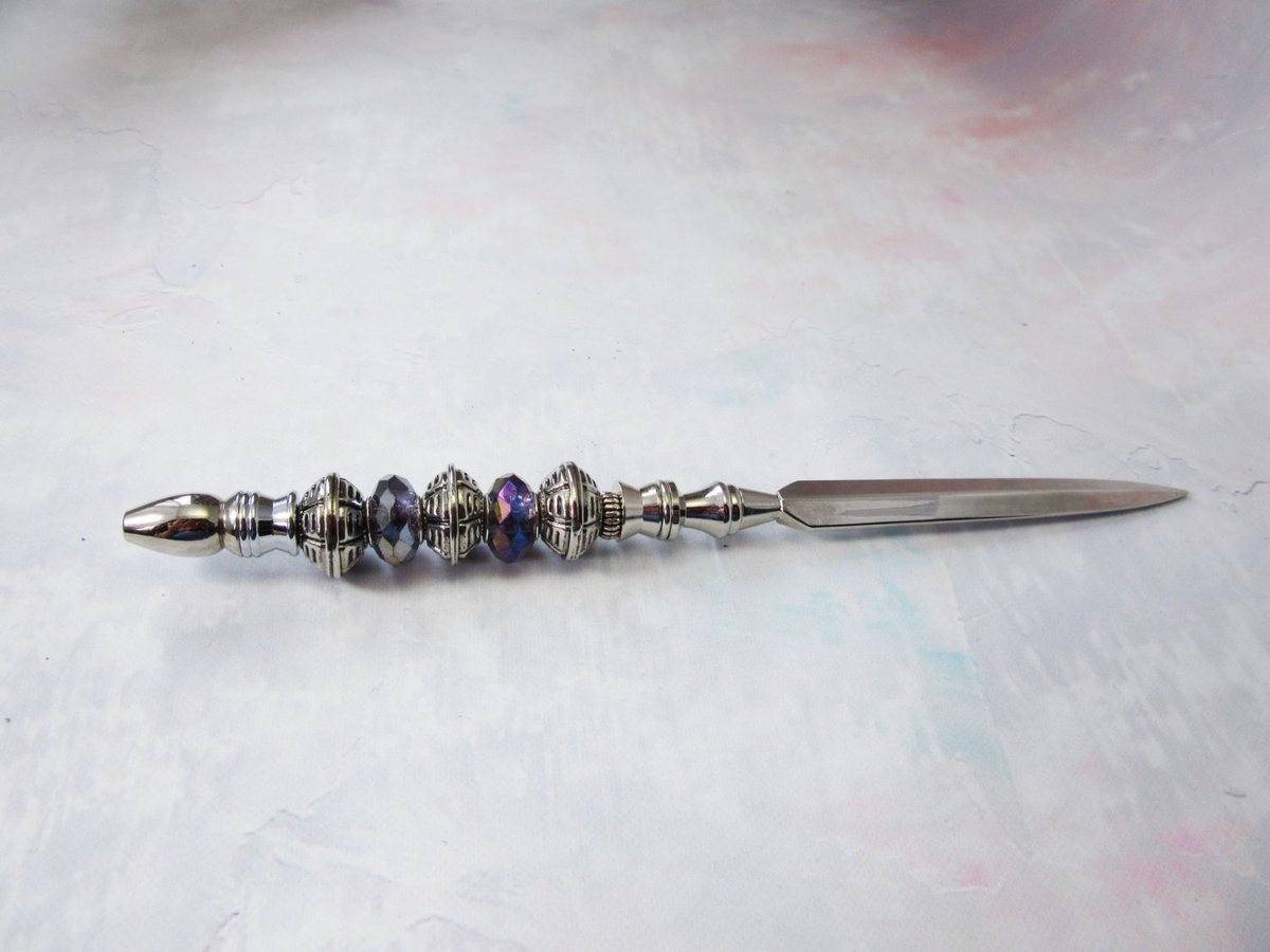Gwynstone's tweet photo. silver letter opener - purple shimmery - crystal facets - silvertone… https://t.co/dekg8mQvuw #Etsy #OfficeAccessory https://t.co/I19W4x0feQ
