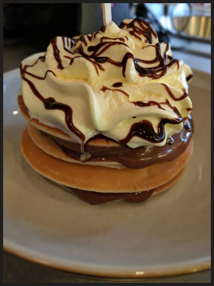 NavahoCoffee's tweet photo. Pancakes pancakes pancakes - how will you have yours? These are with Nutella topped with freshly whipped cream - yum! https://t.co/n7R0TxCVhj