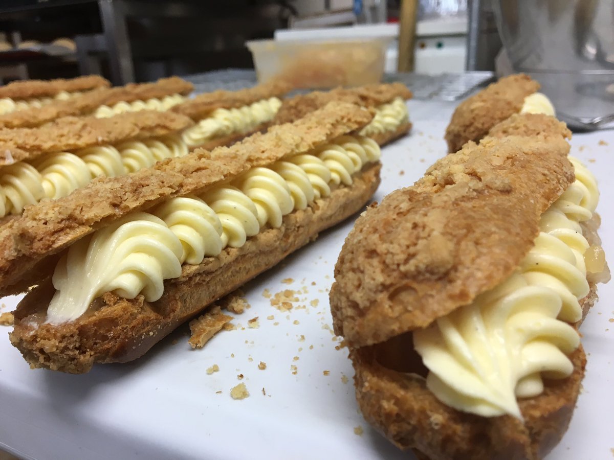 crwstcymru's tweet photo. So, apparently it's #NationalAppleDay so we couldn't go without showcasing our original and fav Apple Crumble &amp; Custard Eclairs! 😍 #Crwst https://t.co/vJ9d3QlNcd
