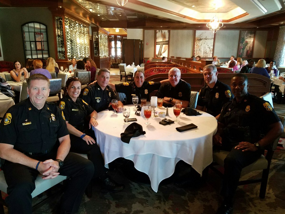 TampaPD's tweet photo. Our Police captains showing their support for @TheSpringTB at the 4th annual @RuthsChris Lunch. #NationalDomesticViolenceAwarenessMonth https://t.co/uH8o3xZxEP