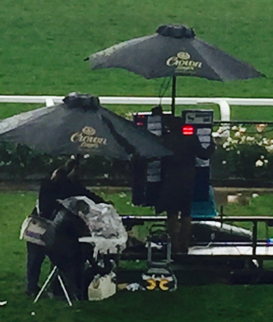njhickey's tweet photo. Clinging on for dear life. #bookies #CoxPlate #DontLetBoardEscape #Wind #AndRain https://t.co/odF5cAzhZl