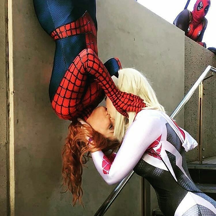 2016. Spidergirl and Spidergwen cosplay with deadpool admiring the scenery....