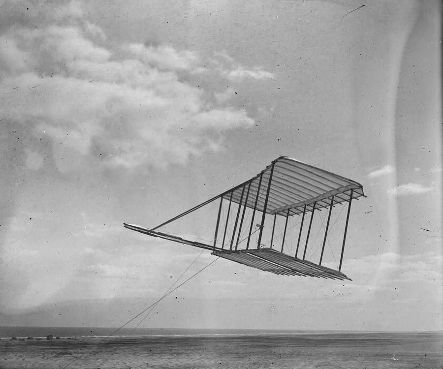NASAhistory's tweet photo. The Wright brothers flew their first glider several times with Wilbur at the helm #OTD in 1900, their first step toward powered flight. https://t.co/k2pLx3lIeE