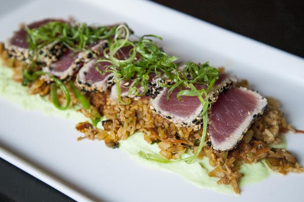 Rare Seared #1 Tuna Loin: edamame puree, crab fried rice, sriracha aioli,
miso drizzle, scallion threads.