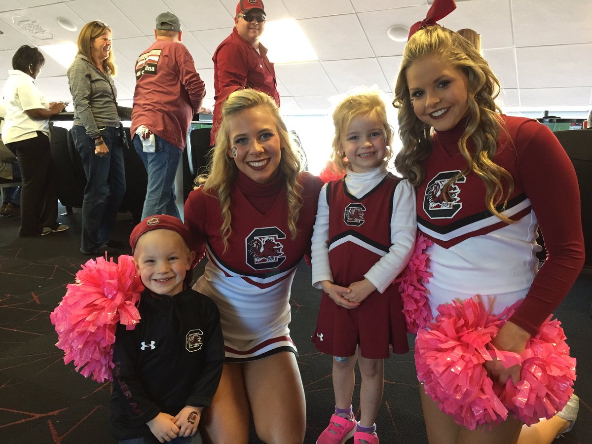 Two customers were able to get a picture with <a href="/GamecockFB/">South Carolina Football</a> cheerleaders. <a href="/UofSC/">University of South Carolina</a> #GoCocks. Beat #UMass. Schedule your appointment for Monday!