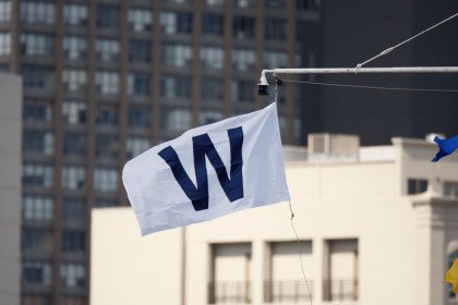 big_ant95's tweet photo. Our racist ass neighbor threw this flag on his house and my dad thought it stood for "white power" 😂 turns out it was a cubs flag https://t.co/CjIkw2xr2K