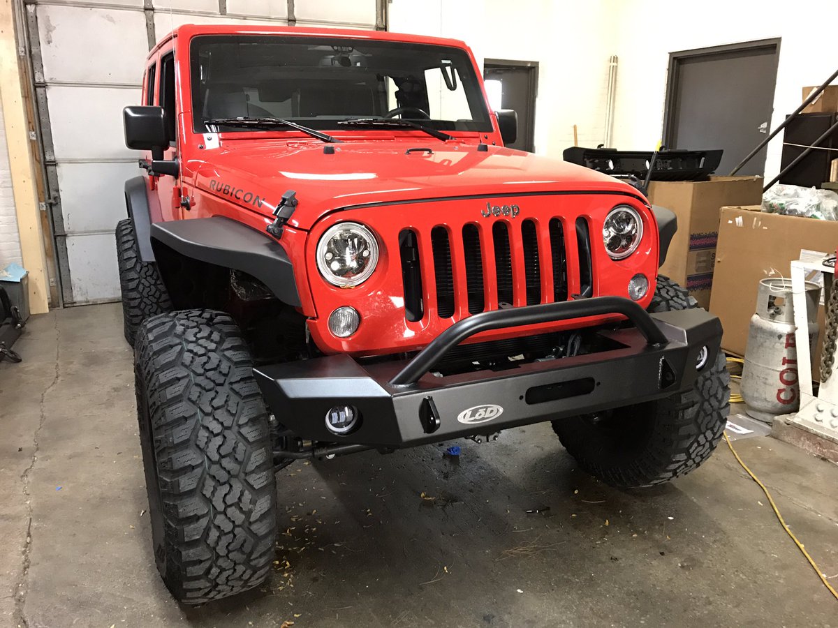 Front mostly done, LOD Signature Series Mid-Width bumper, Nemesis Odyssey aluminum fenders.