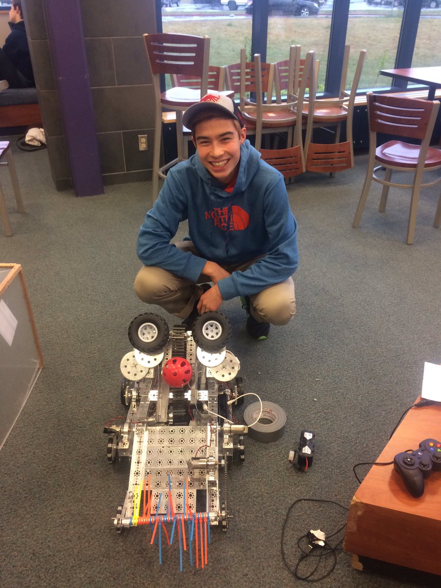 Great practice today team! Here's Shafer with our new built robot!