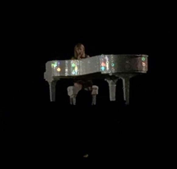 SwiftNYC's tweet photo. Sparkly piano for This Is What You Came For! @taylorswift13's first time performing this! #TaylorSwiftOnUSGP https://t.co/ZNBDmJNd4J